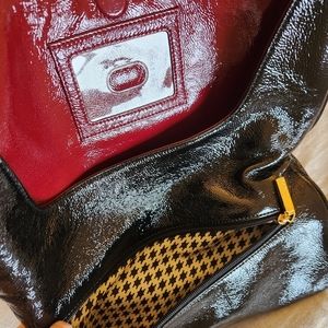 HOBO International black patent clutch